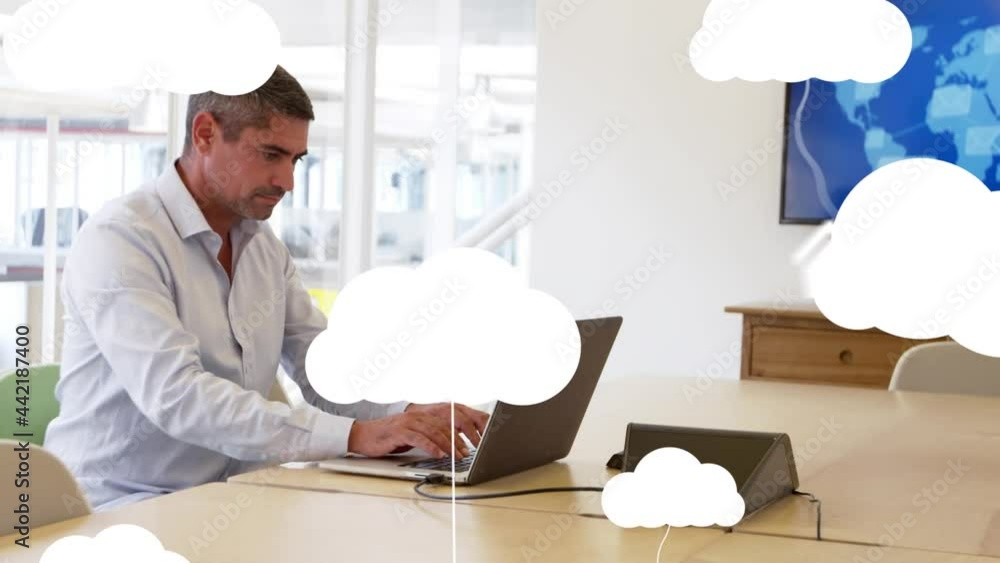 Poster animation of clouds and digital icons over businessman using laptop computer