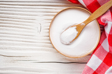 baking soda powder on wooden rustic background background