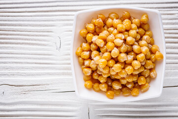boiled chickpeas on a white wooden rustic background