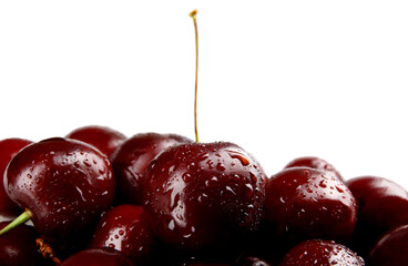 Ripe juicy petioles on a white background. Ripe cherries background.