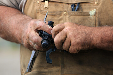 Working hands in the field 