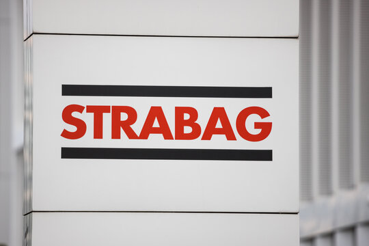 dusseldorf, north rhine westphalia/germany - 26 06 2021: strabag company sign on a building