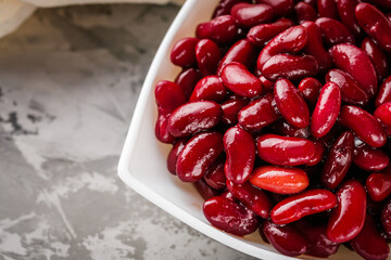 canned red kidney beans on a dark stone rustic background