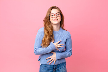 pretty red head woman laughing out loud at some hilarious joke