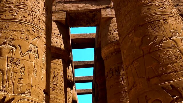 Various hieroglyphs, signs and symbols depicted on  the pillars inside Karnak Temple in Luxor, Egypt. 