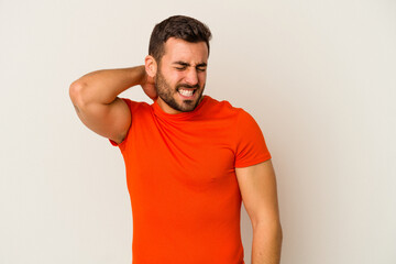 Young caucasian man isolated on white background suffering neck pain due to sedentary lifestyle.