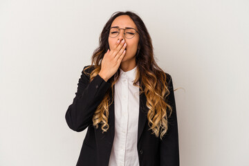 Young mexican business woman isolated on white background yawning showing a tired gesture covering...