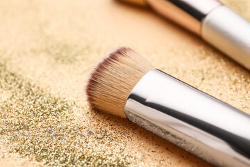 Makeup brush on color background