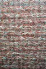 High brick wall on a street