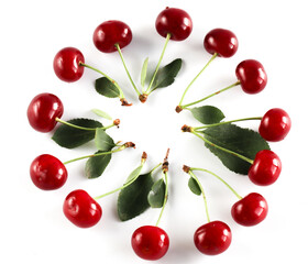 Circle of cherry berries with leaves