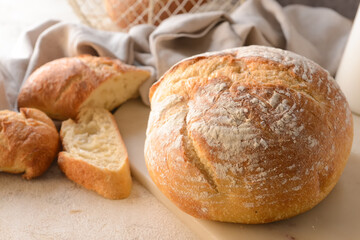 Loaf of sourdough bread on grunge background