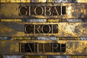 Global Crop Failure text on vintage textured grunge copper and gold background