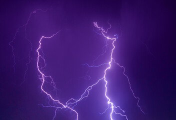 Night sky with various lightning in natural colors