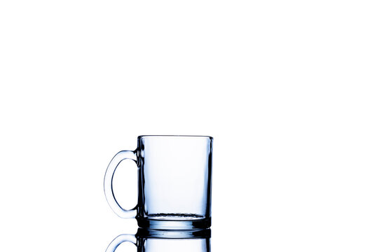 An empty glass for water, juice or milk Cocktail drink Household items Isolated on white background