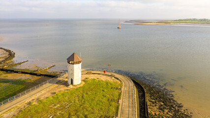 Brightlingsea lighthouse tower at sunset with stunning light special seaside day, Essex, England, UK