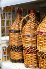 bottles, wine jugs, jars braided with rattan wood vine