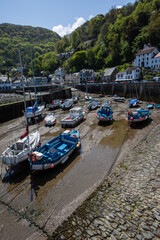 Fototapeta na wymiar Pleasure boats in Lynmouth harbour, Devon, England