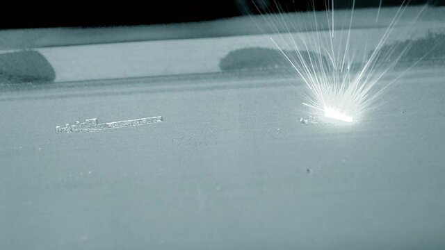 3D printer prints object from metal powder.