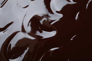 Delicious chocolate cream as background, closeup view
