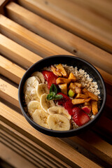 Palatable summer porridge with fruit, honey and cinnamon