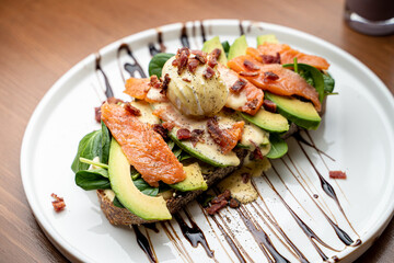 Avocado toast with salmon and poached egg