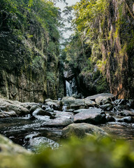 Naklejka na ściany i meble waterfall in forest sri lanka