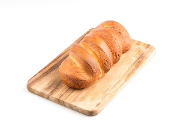 Bread loaf on a wooden chopping board