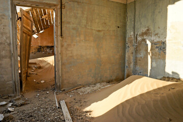 Interior of old building in abandoned diamond mining town of Kolmanskop (Kolmannskuppe), Namibia