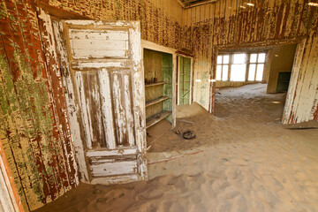 Interior of old building in abandoned diamond mining town of Kolmanskop (Kolmannskuppe), Namibia