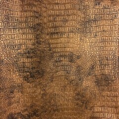 Artificial leather texture with croc skin pattern in bronze color
