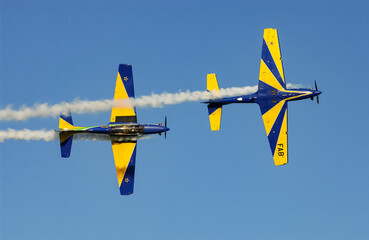 Brazilian Air Force smoke squadron. Aerobatic maneuver planes performing in the sky in João...