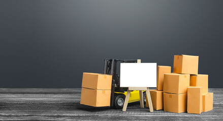 Forklift with boxes and blank easel sign. Warehousing concept and logistics transportation of goods...