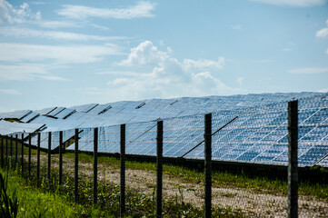 Fototapeta premium solar power source is via photovoltaic modules that convert light directly to electricity.