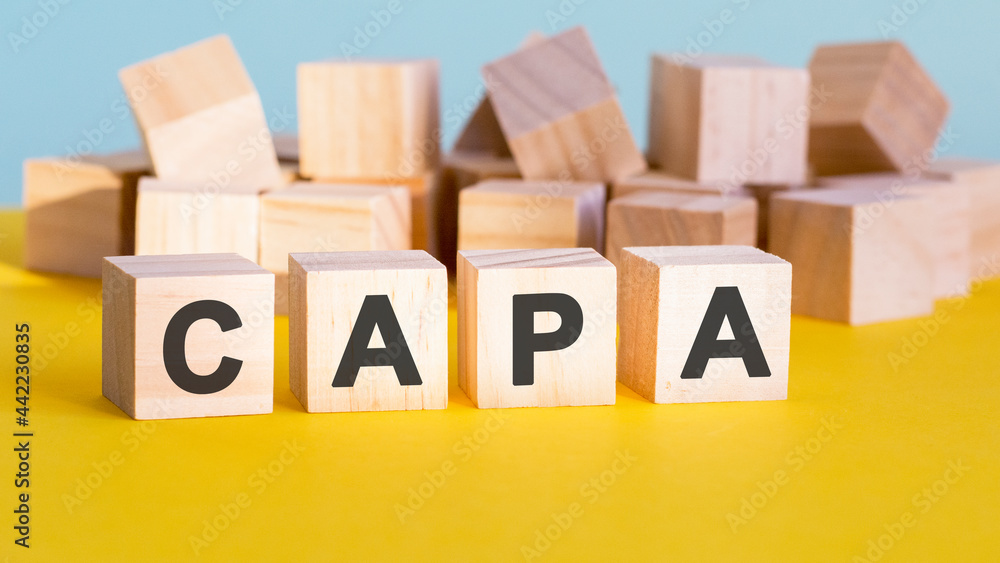 Poster capa word construction with letter blocks and a shallow depth of field