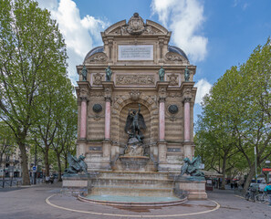 Fototapeta na wymiar Paris, France - 05 02 2021: Latin quarter. Saint-Michel fountain, struggle of good against evil.