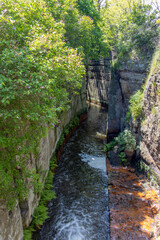 A canyon is an artificially created canal, a medieval technical monument serving as an outlet to the pond, Zahradky, Czechia.