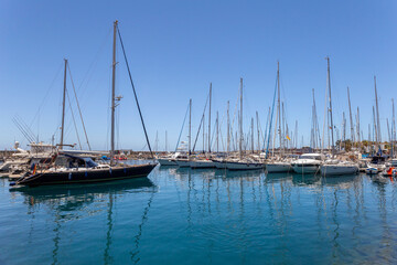 Fototapeta na wymiar Boats at Puerto de Mogan (port of Mogan) in Gran Canaria