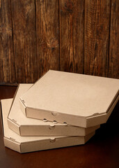 Boxes on wooden background. Delivery concept.