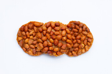 Fried peanut cookies on white background.