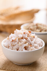 Organic Thai highland cooked  brown rice in a bowl (Cargo rice, Loonzain rice or Husked rice), Healthy food