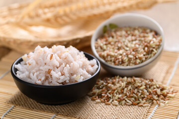 Organic Thai highland cooked  brown rice in a bowl (Cargo rice, Loonzain rice or Husked rice), Healthy food