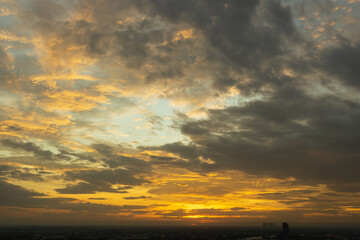 sunset in the sky over the city