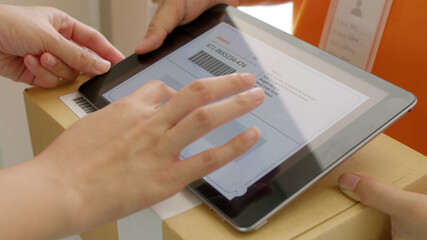 Close-up hand asia people girl send receive pickup express postal post mail from retail order online e-commerce store worker carry container and smart digital tablet device at door home city life.