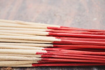 Brown indian incense aroma relaxation sticks  background or texture