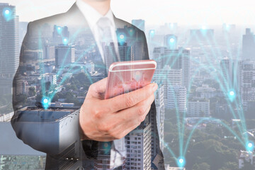 Double exposure of businessman use smartphone, communication 4G 5G node networking telephone...