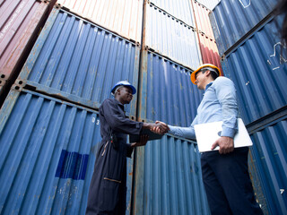 Businessmen ceo manager south africa Customs Broker shake hand Shipper trade cargo port logistic...