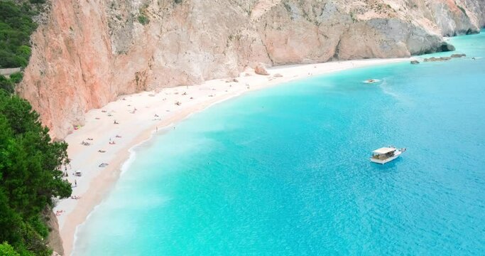View on famous beach Porto Katsiki with tourists at Lefkada island, Greece. Summer holidays in Greek Ionian islands concept.