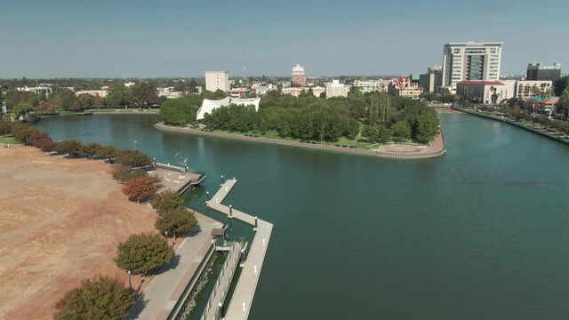 Aerial: Weber Point, San Joaquin river and downtown Stockton, USA