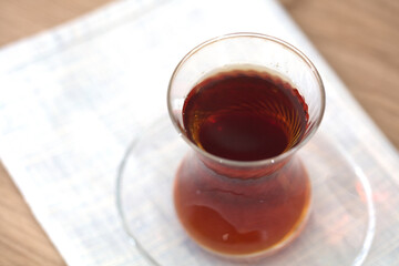 A cup of Turkish black tea on the table