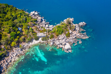 Clean Clear Blue Ocean Sea Water with rocks beach no people copy space paradise tropical island...